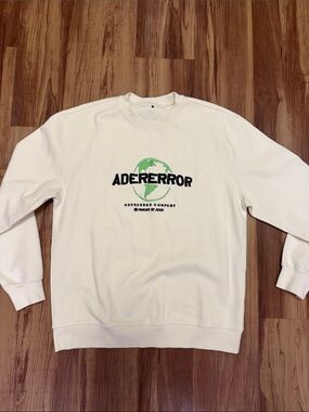 AderError Cream Crewneck Sweatshirt with Green Globe Logo